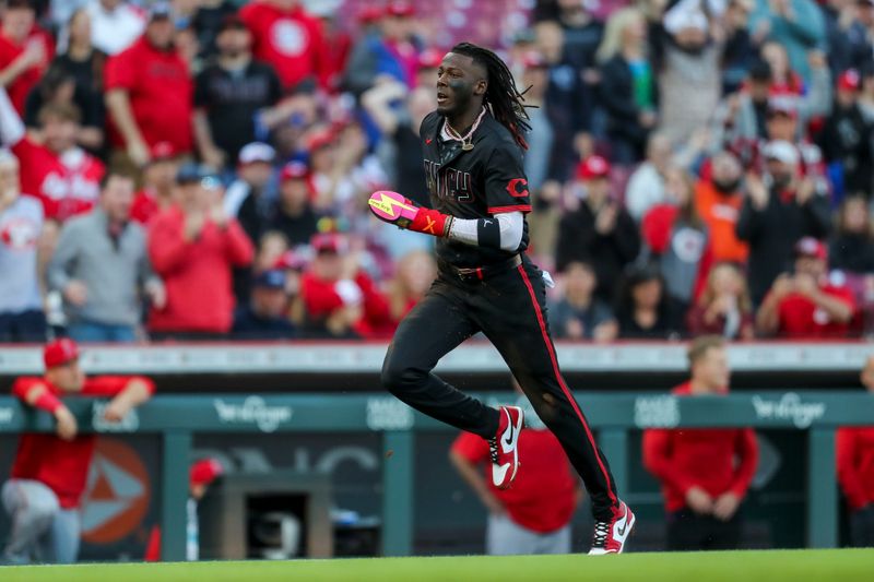 Apr 19, 2024; Cincinnati, Ohio, USA; Cincinnati Reds shortstop Elly De La Cruz (44) steals home on an error by Los Angeles Angels catcher Logan O'Hoppe (not pictured) in the second inning at Great American Ball Park. Mandatory Credit: Katie Stratman-USA TODAY Sports