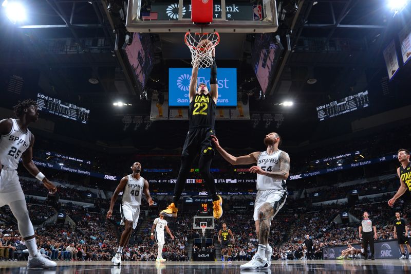 SAN ANTONIO, TX - OCTOBER 12: Kyle Filipowski #22 of the Utah Jazz dunks the ball during the game against the San Antonio Spurs during a NBA pre season game on October 12, 2024 at the Frost Bank Center in San Antonio, Texas. NOTE TO USER: User expressly acknowledges and agrees that, by downloading and or using this photograph, user is consenting to the terms and conditions of the Getty Images License Agreement. Mandatory Copyright Notice: Copyright 2024 NBAE (Photos by Michael Gonzales/NBAE via Getty Images)