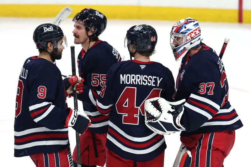Dec 13, 2025; Winnipeg, Manitoba, CAN; Winnipeg Jets celebrate their victory against the Washington Capitals at Canada Life Centre. Mandatory Credit: James Carey Lauder-Imagn Images