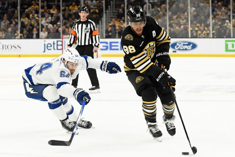 Feb 13, 2024; Boston, Massachusetts, USA; Boston Bruins right wing David Pastrnak (88) controls the puck while Tampa Bay Lightning center Tyler Motte (64) defends during the first period at TD Garden. Mandatory Credit: Bob DeChiara-USA TODAY Sports