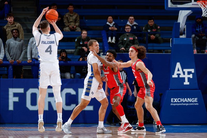 Feb 10, 2023; Colorado Springs, Colorado, USA; Air Force Falcons guard Carter Murphy (4) attempts a shot as guard Corbin Green (15) screens New Mexico Lobos guard Jamal Mashburn Jr. (5) and forward Josiah Allick (53) in the first half at Clune Arena. Mandatory Credit: Isaiah J. Downing-USA TODAY Sports