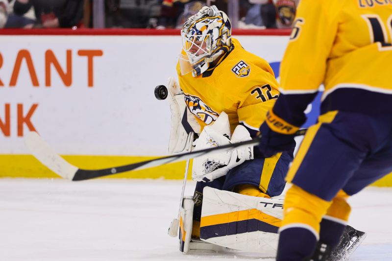 Mar 21, 2024; Sunrise, Florida, USA; Nashville Predators goaltender Kevin Lankinen (32) makes a save against the Florida Panthers during the second period at Amerant Bank Arena. Mandatory Credit: Sam Navarro-USA TODAY Sports