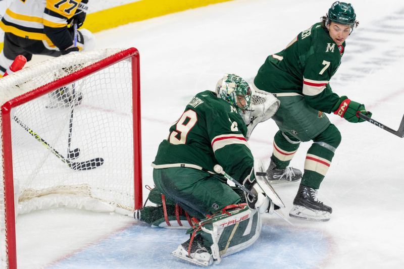 Feb 9, 2024; Saint Paul, Minnesota, USA; Minnesota Wild goaltender Marc-Andre Fleury (29) makes a save on Pittsburgh Penguins in the second period at Xcel Energy Center. Mandatory Credit: Matt Blewett-USA TODAY Sports