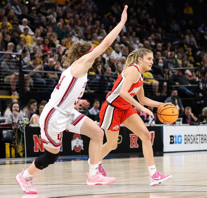 Mar 4, 2023; Minneapolis, MINN, USA; Ohio State Buckeyes guard Jacy Sheldon (4) dribbles while Indiana Hoosiers guard Grace Berger (34) defends during the first half at Target Center. Mandatory Credit: Matt Krohn-USA TODAY Sports