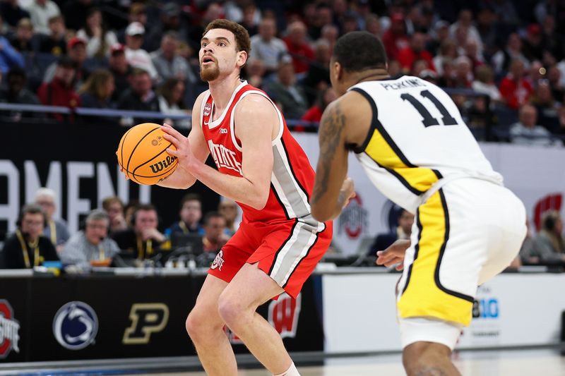 Mar 14, 2024; Minneapolis, MN, USA; Ohio State Buckeyes forward Jamison Battle (10) shoots as Iowa Hawkeyes guard Tony Perkins (11) defends during the second half at Target Center. Mandatory Credit: Matt Krohn-USA TODAY Sports