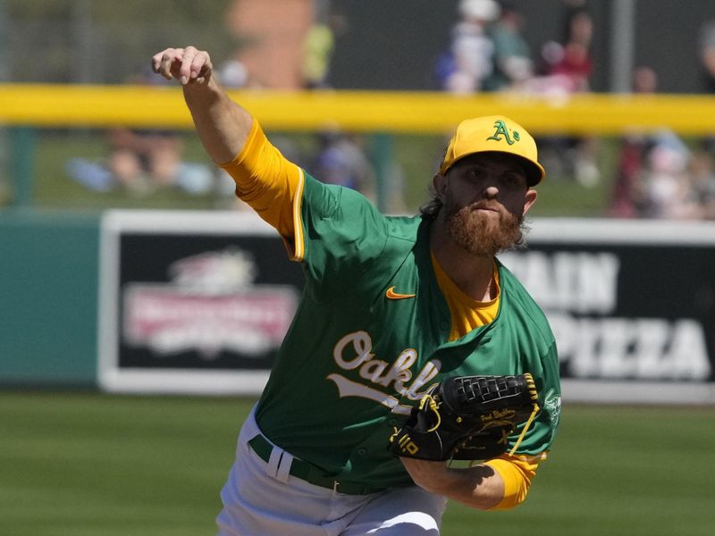 Mar 10, 2024; Mesa, Arizona, USA; Oakland Athletics starting pitcher Paul Blackburn (58) throws against the Kansas City Royals in the first inning at Hohokam Stadium. Mandatory Credit: Rick Scuteri-USA TODAY Sports