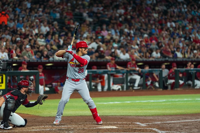 Apr 14, 2024; Phoenix, Arizona, USA; St. Louis Cardinals infielder Nolan Arenado (28) at bat in the second inning during a game against the Arizona Diamondbacks at Chase Field. Mandatory Credit: Allan Henry-USA TODAY Sports