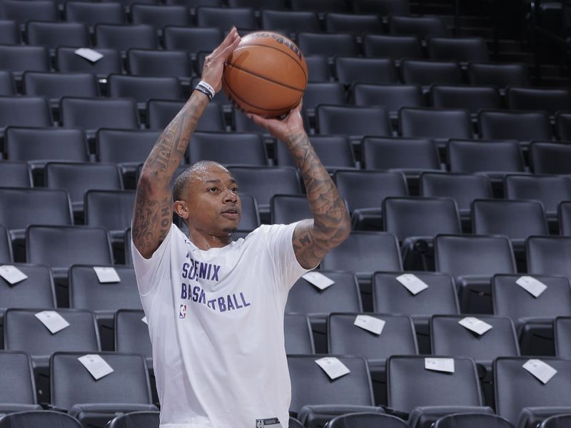 SACRAMENTO, CA - APRIL 12: Isaiah Thomas #4 of the Phoenix Suns warms up before the game against the Sacramento Kings on April 12, 2024 at Golden 1 Center in Sacramento, California. NOTE TO USER: User expressly acknowledges and agrees that, by downloading and or using this Photograph, user is consenting to the terms and conditions of the Getty Images License Agreement. Mandatory Copyright Notice: Copyright 2024 NBAE (Photo by Rocky Widner/NBAE via Getty Images)