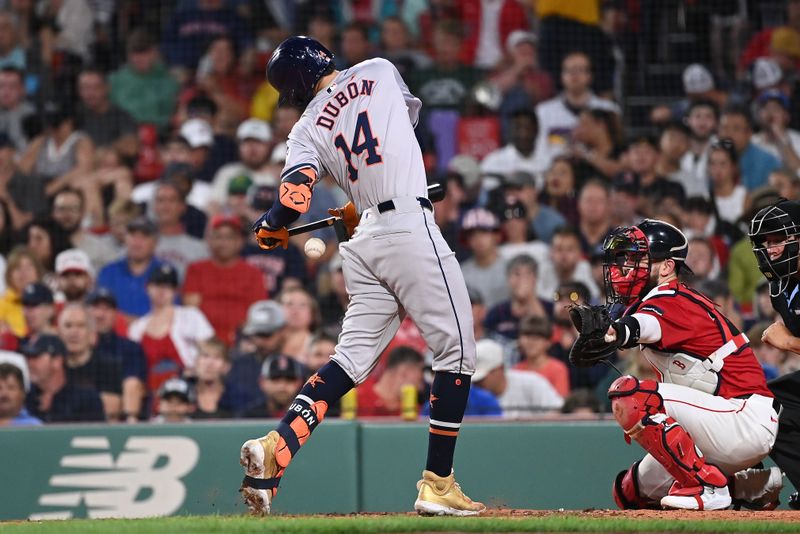 Aug 9, 2024; Boston, Massachusetts, USA; Houston Astros right fielder Mauricio Dubon (14) gets hit by a pitch during the fifth inning against the Boston Red Sox at Fenway Park. Mandatory Credit: Eric Canha-USA TODAY Sports