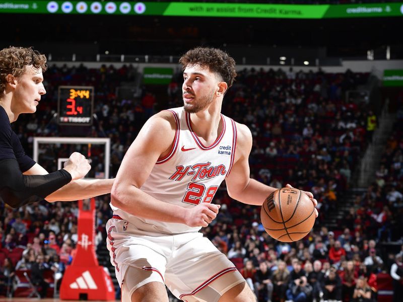 HOUSTON, TX - JANUARY 20: Alperen Sengun #28 of the Houston Rockets dribbles the ball during the game against the Utah Jazz on January 20, 2024 at the Toyota Center in Houston, Texas. NOTE TO USER: User expressly acknowledges and agrees that, by downloading and or using this photograph, User is consenting to the terms and conditions of the Getty Images License Agreement. Mandatory Copyright Notice: Copyright 2024 NBAE (Photo by Logan Riely/NBAE via Getty Images)