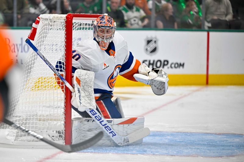 Oct 12, 2024; Dallas, Texas, USA; New York Islanders goaltender Semyon Varlamov (40) faces the Dallas Stars attack during the second period at the American Airlines Center. Mandatory Credit: Jerome Miron-Imagn Images