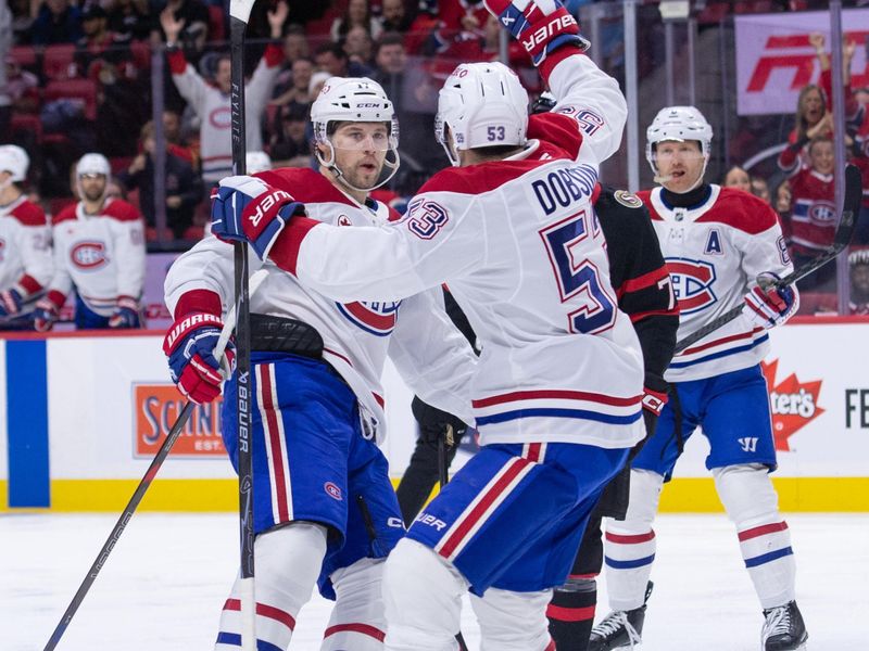 Jan 17, 2026; Ottawa, Ontario, CAN; Montreal Canadiens right wing Josh Anderson (17) celebrates with defenseman Noah Dobson (53) after scoring a goal in the second period against the Ottawa Senators at the Canadian Tire Centre. Mandatory Credit: Marc DesRosiers-IMAGN Images
