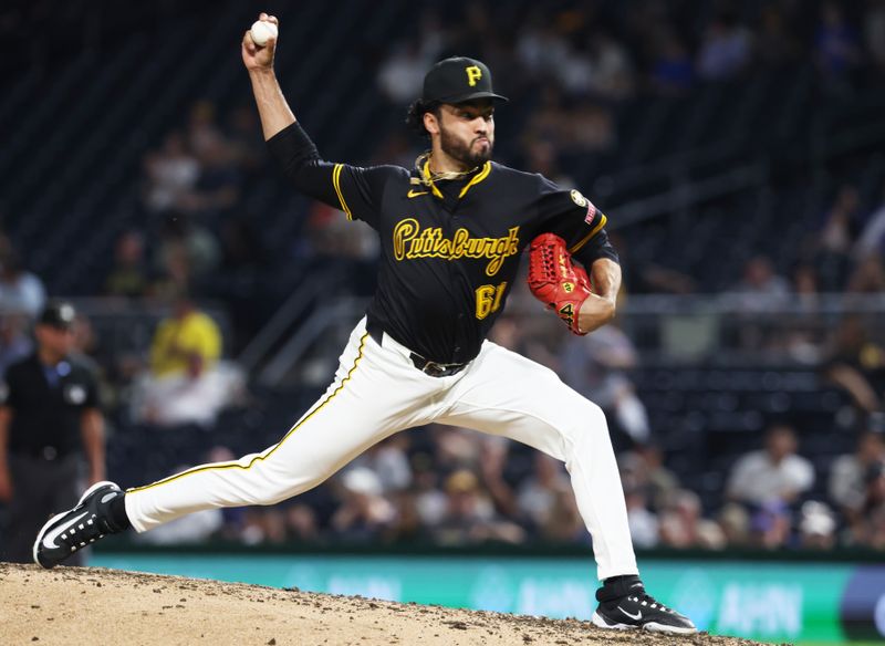Sep 16, 2025; Pittsburgh, Pennsylvania, USA; Pittsburgh Pirates relief pitcher Justin Lawrence (61) pitches against the Chicago Cubs during the sixth inning at PNC Park. Mandatory Credit: Charles LeClaire-Imagn Images