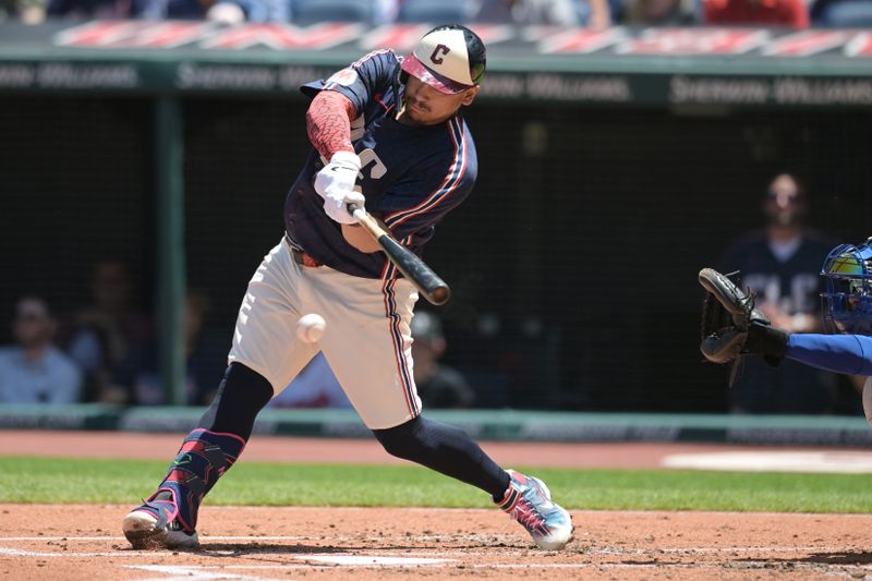 Jun 6, 2024; Cleveland, Ohio, USA; Cleveland Guardians first baseman Josh Naylor (22) hits an RBI ground out during the first inning against the Kansas City Royals at Progressive Field. Mandatory Credit: Ken Blaze-USA TODAY Sports