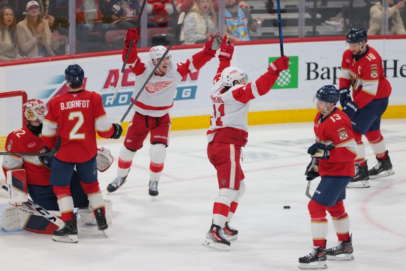 Jan 16, 2025; Sunrise, Florida, USA; Detroit Red Wings center Dylan Larkin (71) celebrates after scoring against the Florida Panthers during the second period at Amerant Bank Arena. Mandatory Credit: Sam Navarro-Imagn Images