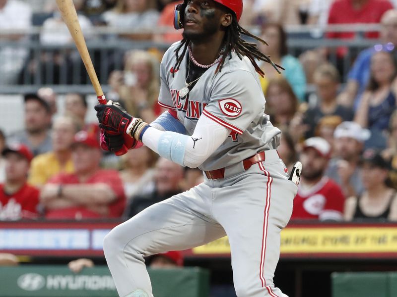 Jun 17, 2024; Pittsburgh, Pennsylvania, USA;  Cincinnati Reds shortstop Elly De La Cruz (44) hits a double against the Pittsburgh Pirates during the third inning at PNC Park. Mandatory Credit: Charles LeClaire-USA TODAY Sports