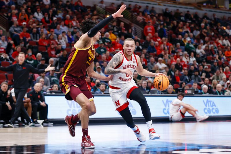 Mar 8, 2023; Chicago, IL, USA; Nebraska Cornhuskers guard C.J. Wilcher (0) drives to the basket against Minnesota Golden Gophers forward Dawson Garcia (3) during the second half at United Center. Mandatory Credit: Kamil Krzaczynski-USA TODAY Sports