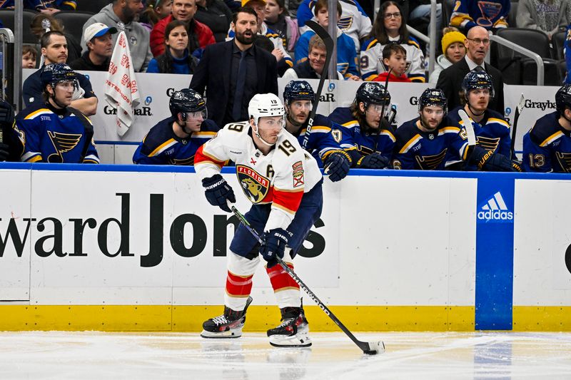 Jan 9, 2024; St. Louis, Missouri, USA;  Florida Panthers left wing Matthew Tkachuk (19) controls the puck against the St. Louis Blues during the third period at Enterprise Center. Mandatory Credit: Jeff Curry-USA TODAY Sports