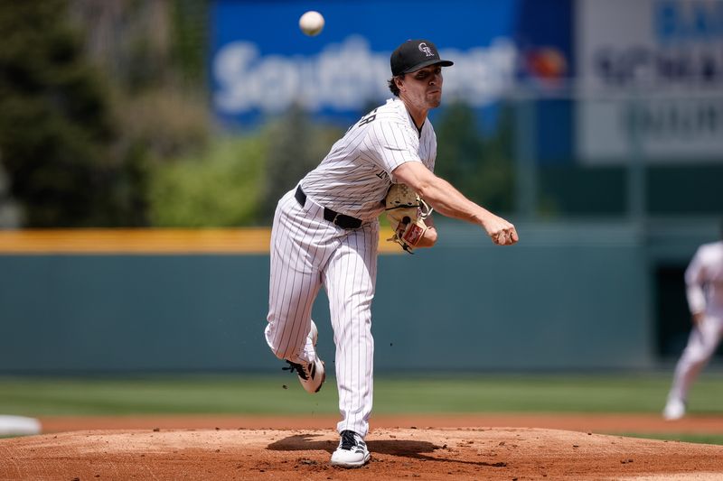 Apr 30, 2025; Denver, Colorado, USA; Colorado Rockies starting pitcher Chase Dollander (32) pitches in the first inning against the Atlanta Braves at Coors Field. Mandatory Credit: Isaiah J. Downing-Imagn Images