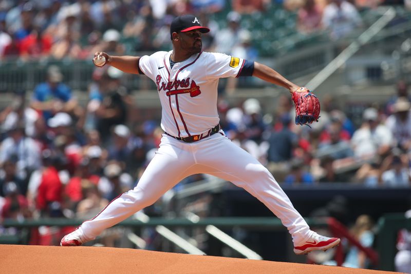 Jul 7, 2024; Atlanta, Georgia, USA; Atlanta Braves pitcher Reynaldo Lopez (40) throws against the Philadelphia Phillies in the first inning at Truist Park. Mandatory Credit: Brett Davis-USA TODAY Sports
