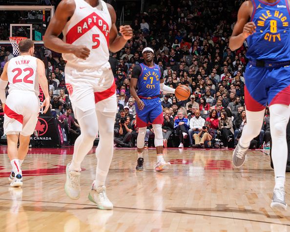 TORONTO, CANADA - DECEMBER 20:  Reggie Jackson #7 of the Denver Nuggets handles the ball during the game  on December 20, 2023 at the Scotiabank Arena in Toronto, Ontario, Canada.  NOTE TO USER: User expressly acknowledges and agrees that, by downloading and or using this Photograph, user is consenting to the terms and conditions of the Getty Images License Agreement.  Mandatory Copyright Notice: Copyright 2023 NBAE (Photo by Mark Blinch/NBAE via Getty Images)