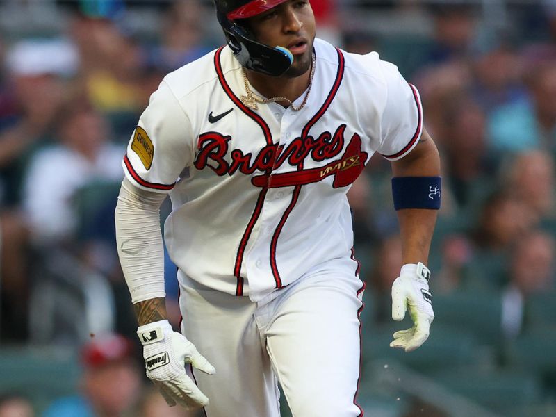 Sep 7, 2023; Atlanta, Georgia, USA; Atlanta Braves left fielder Eddie Rosario (8) hits a two-run single against the St. Louis Cardinals in the first inning at Truist Park. Mandatory Credit: Brett Davis-USA TODAY Sports
