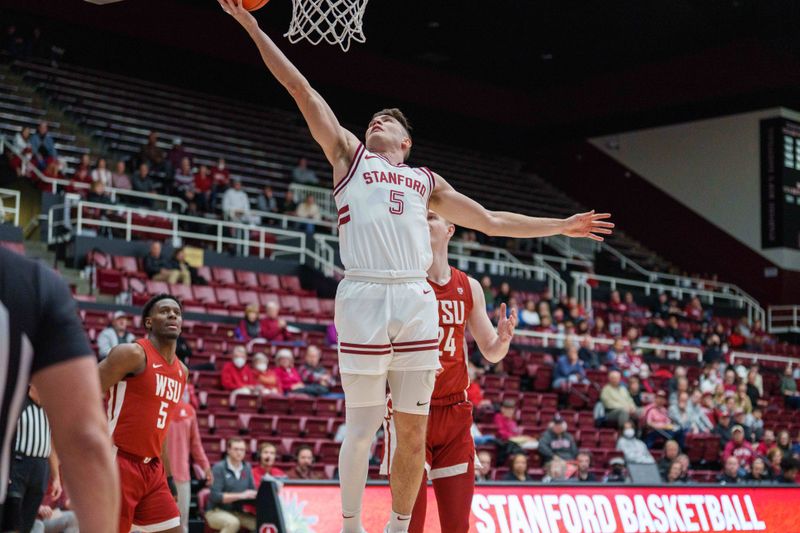 Feb 23, 2023; Stanford, California, USA;  Stanford Cardinal guard Michael O'Connell (5) shoots a layup against Washington State Cougars guard Justin Powell (24) during the first half at Maples Pavilion. Mandatory Credit: Neville E. Guard-USA TODAY Sports