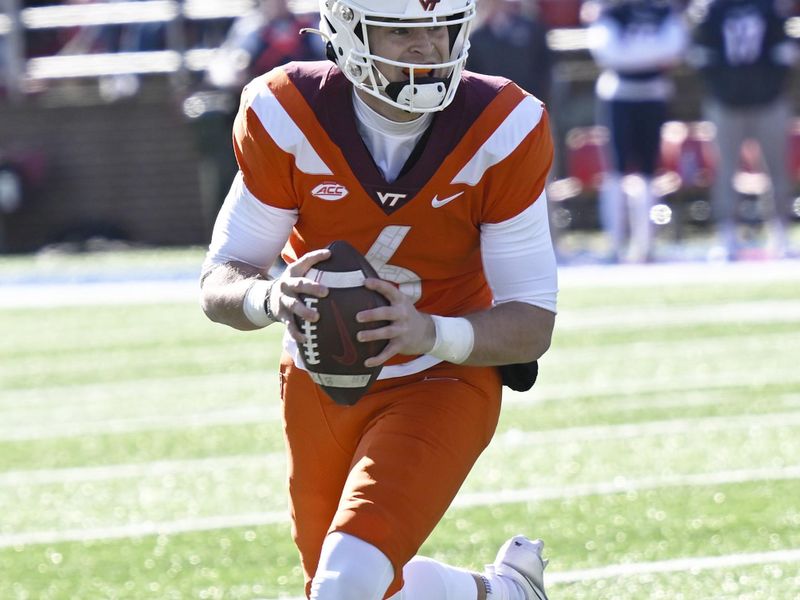 Nov 19, 2022; Lynchburg, Virginia, USA;Virginia Tech Hokies quarterback Grant Wells (6) rolls out against Liberty in the first half at Williams Stadium. Mandatory Credit: Lee Luther Jr.-USA TODAY Sports