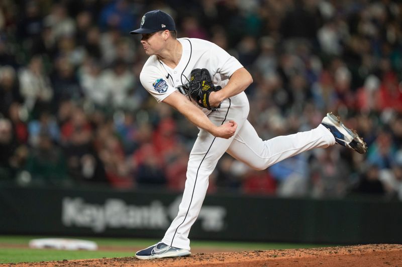 Apr 21, 2023; Seattle, Washington, USA; Seattle Mariners reliever Trevor Gott (30) delivers a pitch during the eighth inning against the St. Louis Cardinals at T-Mobile Park. Mandatory Credit: Stephen Brashear-USA TODAY Sports