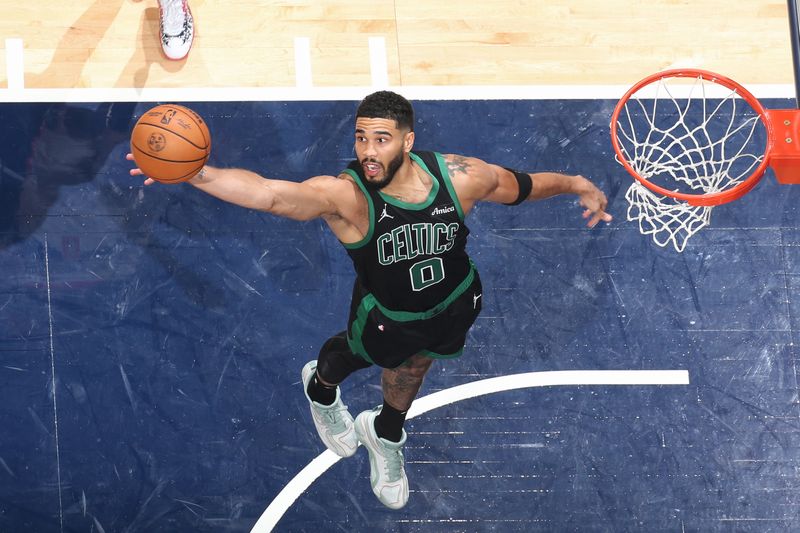 WASHINGTON, DC -? OCTOBER 24: Jayson Tatum #0 of the Boston Celtics rebounds the ball during the game against the Washington Wizards on October 24, 2024 at Capital One Arena in Washington, DC. NOTE TO USER: User expressly acknowledges and agrees that, by downloading and or using this Photograph, user is consenting to the terms and conditions of the Getty Images License Agreement. Mandatory Copyright Notice: Copyright 2024 NBAE (Photo by Stephen Gosling/NBAE via Getty Images)