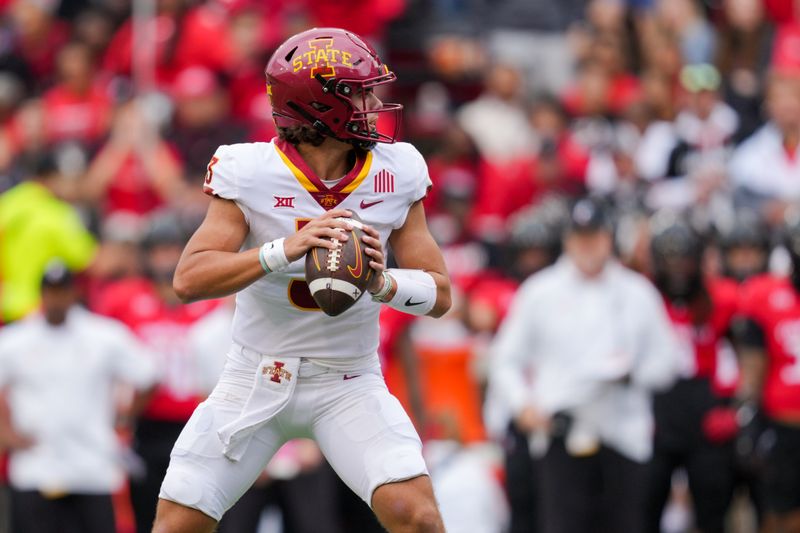 Oct 14, 2023; Cincinnati, Ohio, USA;  Iowa State Cyclones quarterback Rocco Becht (3) drops back to pass against the Cincinnati Bearcats in the first half at Nippert Stadium. Mandatory Credit: Aaron Doster-USA TODAY Sports