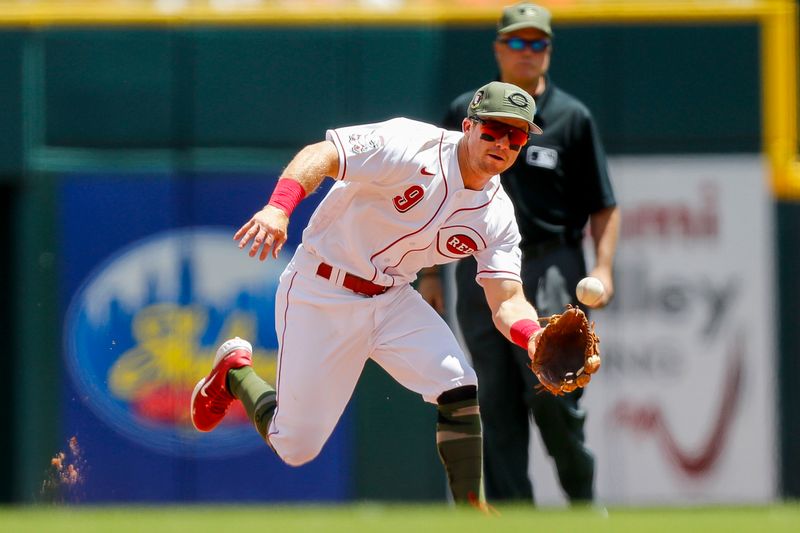 May 21, 2023; Cincinnati, Ohio, USA; Cincinnati Reds shortstop Matt McLain (9) grounds the ball hit by New York Yankees second baseman Gleyber Torres (not pictured) in the eighth inning at Great American Ball Park. Mandatory Credit: Katie Stratman-USA TODAY Sports