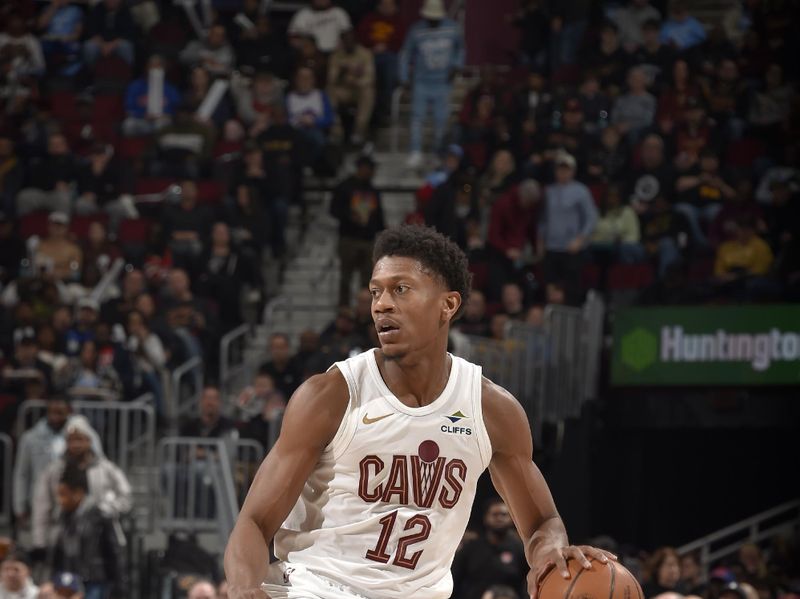 CLEVELAND, OH - FEBRUARY 10: De'Andre Hunter #12 of the Cleveland Cavaliers handles the ball during the game against the Minnesota Timberwolves on February 10, 2025 at Rocket Mortgage FieldHouse in Cleveland, Ohio. NOTE TO USER: User expressly acknowledges and agrees that, by downloading and/or using this Photograph, user is consenting to the terms and conditions of the Getty Images License Agreement. Mandatory Copyright Notice: Copyright 2025 NBAE (Photo by David Liam Kyle/NBAE via Getty Images)