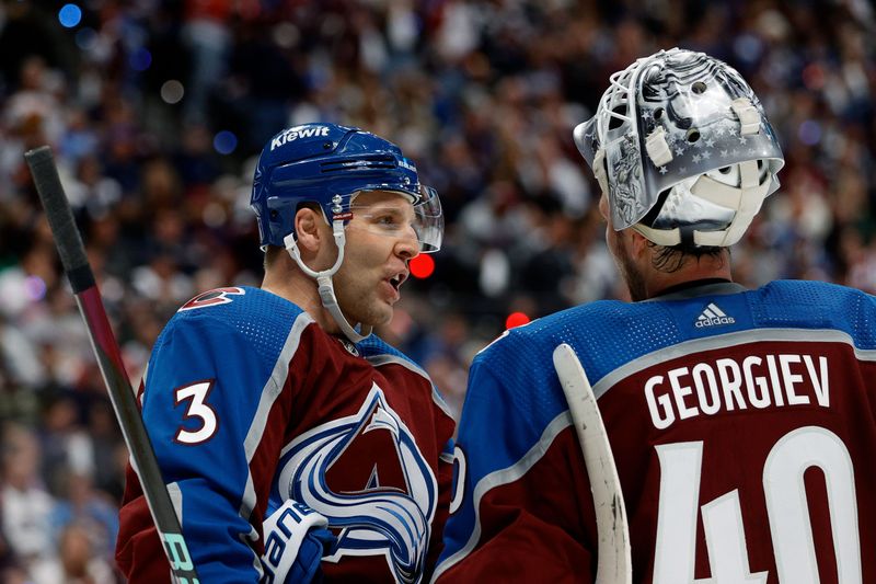 Apr 26, 2024; Denver, Colorado, USA; Colorado Avalanche defenseman Jack Johnson (3) talks with goaltender Alexandar Georgiev (40) in the third period against the Winnipeg Jets in game three of the first round of the 2024 Stanley Cup Playoffs at Ball Arena. Mandatory Credit: Isaiah J. Downing-USA TODAY Sports