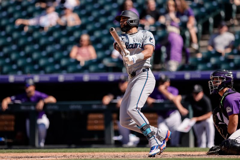 Aug 29, 2024; Denver, Colorado, USA; Miami Marlins center fielder Derek Hill (58) watches his ball on a two run home run in the sixth inning against the Colorado Rockies at Coors Field. Mandatory Credit: Isaiah J. Downing-USA TODAY Sports