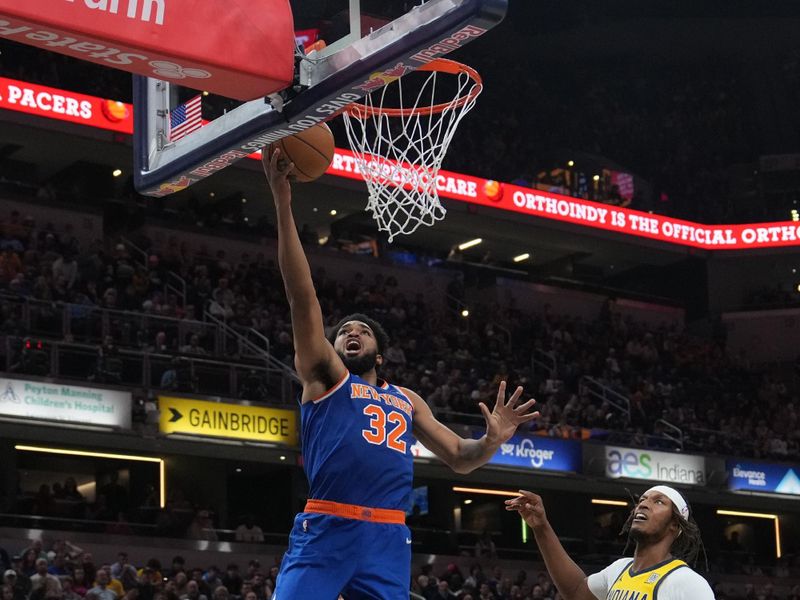 INDIANAPOLIS, IN - NOVEMBER 10: Karl-Anthony Towns #32 of the New York Knicks drives to the basket during the game against the Indiana Pacers on November 10, 2024 at Gainbridge Fieldhouse in Indianapolis, Indiana. NOTE TO USER: User expressly acknowledges and agrees that, by downloading and or using this Photograph, user is consenting to the terms and conditions of the Getty Images License Agreement. Mandatory Copyright Notice: Copyright 2024 NBAE (Photo by A.J. Mast/NBAE via Getty Images)