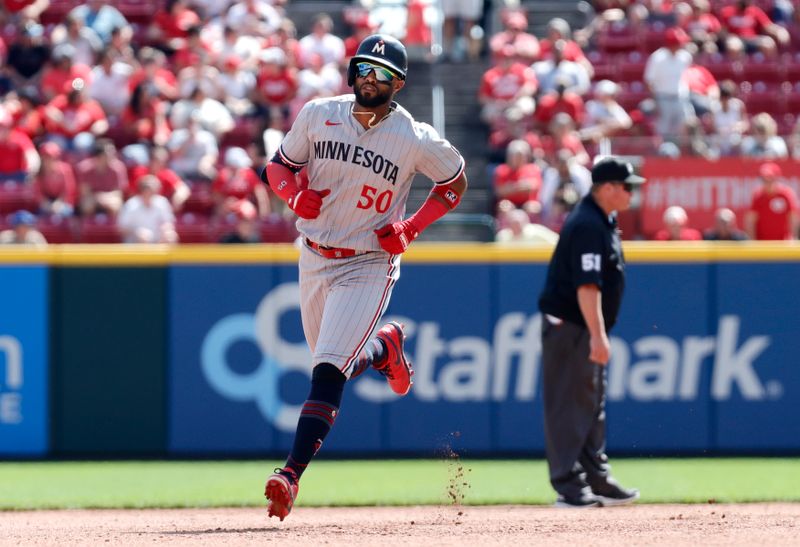 Sep 20, 2023; Cincinnati, Ohio, USA; Minnesota Twins third baseman Willi Castro (50) runs the bases after hitting a solo home run against the Cincinnati Reds during the seventh inning at Great American Ball Park. Mandatory Credit: David Kohl-USA TODAY Sports