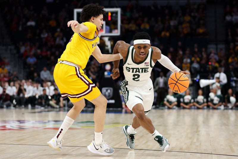 Mar 14, 2024; Minneapolis, MN, USA; Michigan State Spartans guard Tyson Walker (2) plays the ba;; defended by Minnesota Golden Gophers guard Mike Mitchell Jr. (2) during the first half at Target Center. Mandatory Credit: Matt Krohn-USA TODAY Sports