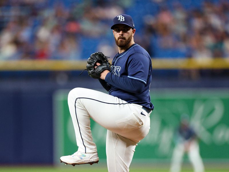 Apr 3, 2024; St. Petersburg, Florida, USA;  Tampa Bay Rays starting pitcher Aaron Civale (34) throws a pitch against the Texas Rangers in the first inning at Tropicana Field. Mandatory Credit: Nathan Ray Seebeck-USA TODAY Sports