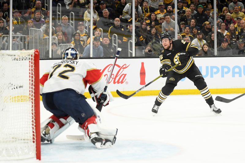 May 12, 2024; Boston, Massachusetts, USA; Boston Bruins defenseman Brandon Carlo (25) shoots the puck on Florida Panthers goaltender Sergei Bobrovsky (72) during the first period in game four of the second round of the 2024 Stanley Cup Playoffs at TD Garden. Mandatory Credit: Bob DeChiara-USA TODAY Sports