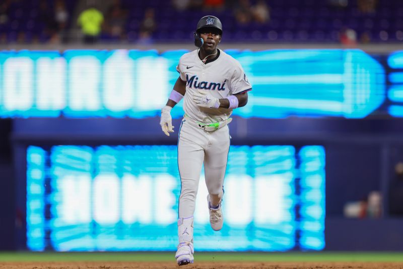 Apr 29, 2024; Miami, Florida, USA; Miami Marlins center fielder Jazz Chisholm Jr. (2) circles the bases after hitting a two-run home run against the Washington Nationals during the sixth inning at loanDepot Park. Mandatory Credit: Sam Navarro-USA TODAY Sports