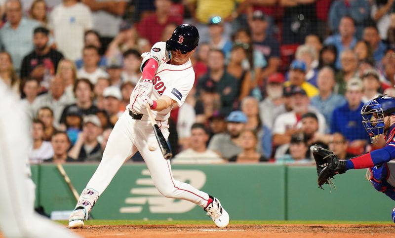 Aug 12, 2024; Boston, Massachusetts, USA; Boston Red Sox second baseman Nick Sogard (75) singles to center in the tenth inning at Fenway Park. Mandatory Credit: David Butler II-USA TODAY Sports