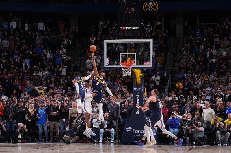 DENVER, CO - NOVEMBER 6: Peyton Watson #8 of the Denver Nuggets makes the game winning block during the game against the Oklahoma City Thunder on November 6, 2024 at Ball Arena in Denver, Colorado. NOTE TO USER: User expressly acknowledges and agrees that, by downloading and/or using this Photograph, user is consenting to the terms and conditions of the Getty Images License Agreement. Mandatory Copyright Notice: Copyright 2024 NBAE (Photo by Garrett Ellwood/NBAE via Getty Images)