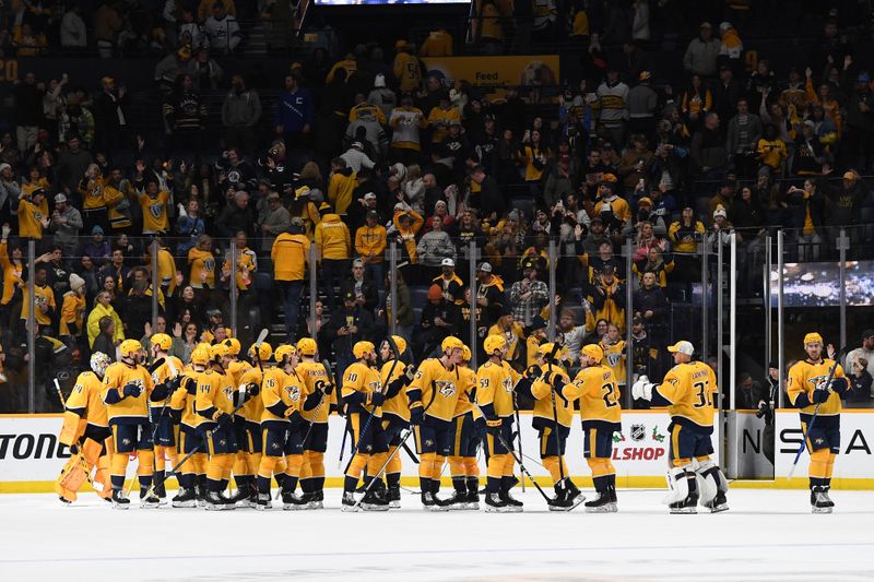 Nov 26, 2023; Nashville, Tennessee, USA; Nashville Predators players celebrate a win against the Winnipeg Jets at Bridgestone Arena. Mandatory Credit: Christopher Hanewinckel-USA TODAY Sports