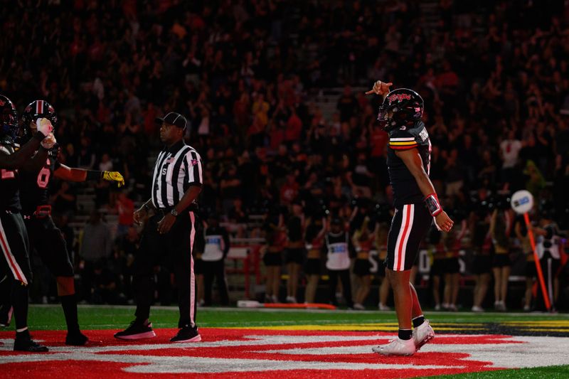 Sep 15, 2023; College Park, Maryland, USA; Maryland Terrapins quarterback Taulia Tagovailoa (3) celebrates after a touchdown during the fourth quarter against the Virginia Cavaliers at SECU Stadium. Mandatory Credit: Reggie Hildred-USA TODAY Sports