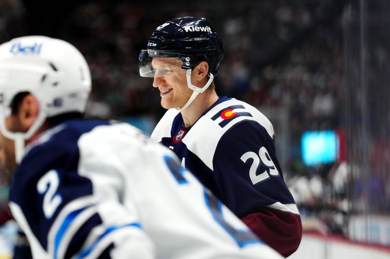 Dec 7, 2023; Denver, Colorado, USA; Colorado Avalanche center Nathan MacKinnon (29) reacts in the second period against the Winnipeg Jets at Ball Arena. Mandatory Credit: Ron Chenoy-USA TODAY Sports