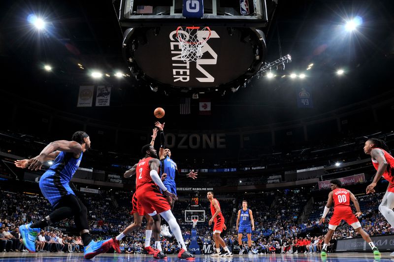 ORLANDO, FL - APRIL 1:  Gary Harris #14 of the Orlando Magic drives to the basket during the game against the Portland Trail Blazers on April 1, 2024 at Kia Center in Orlando, Florida. NOTE TO USER: User expressly acknowledges and agrees that, by downloading and or using this photograph, User is consenting to the terms and conditions of the Getty Images License Agreement. Mandatory Copyright Notice: Copyright 2024 NBAE (Photo by Fernando Medina/NBAE via Getty Images)