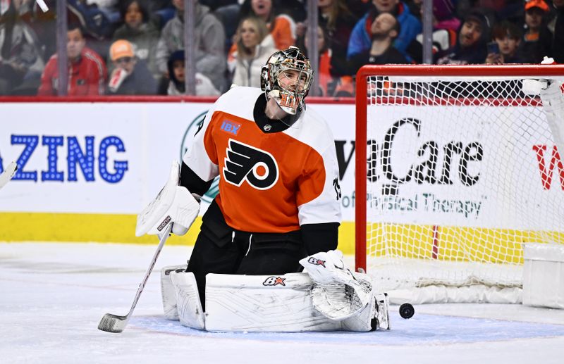 Jan 20, 2024; Philadelphia, Pennsylvania, USA; Philadelphia Flyers goalie Carter Hart (79) reacts after allowing a goal against the Colorado Avalanche in the first period at Wells Fargo Center. Mandatory Credit: Kyle Ross-USA TODAY Sports