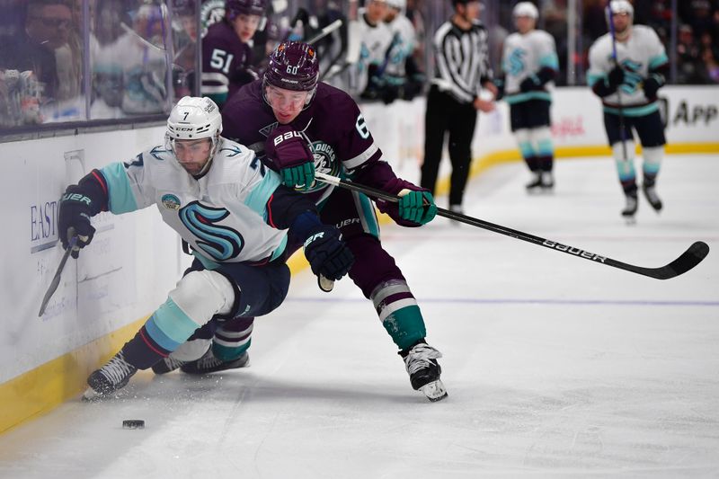 Apr 5, 2024; Anaheim, California, USA; Anaheim Ducks defenseman Jackson LaCombe (60) plays for the puck against Seattle Kraken right wing Jordan Eberle (7) during the third period at Honda Center. Mandatory Credit: Gary A. Vasquez-USA TODAY Sports