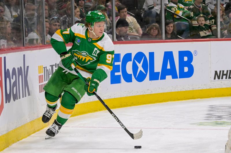 Mar 10, 2024; Saint Paul, Minnesota, USA;  Minnesota Wild forward Kirill Kaprizov (97) skates with the puck against the Nashville Predators during the third period at Xcel Energy Center. Mandatory Credit: Nick Wosika-USA TODAY Sports
